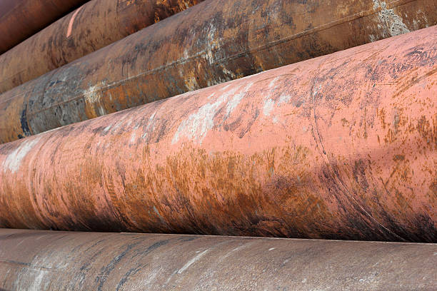 istock Group of old rusty metal pipes 480194636