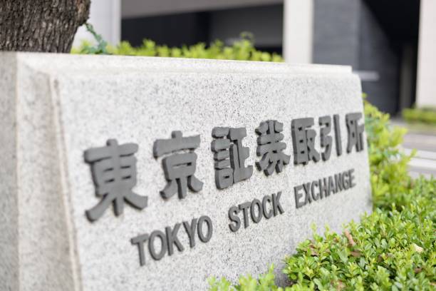 Tokyo Stock Exchange Tokyo, Japan - June 16, 2015: A sign outside the Tokyo Stock Exchange. nikkei index stock pictures, royalty-free photos & images