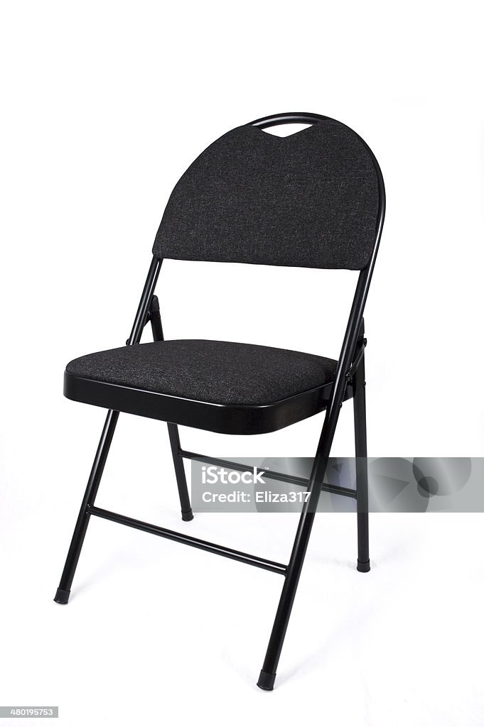 black folding chair 2 black folding chair, shot on a white background and isolated Folding Chair Stock Photo