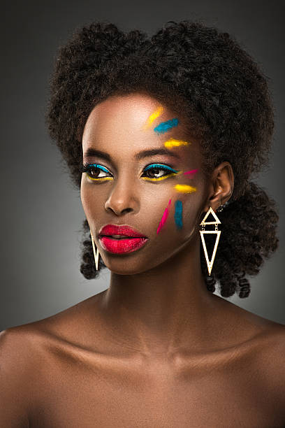 istock Beautiful black lady with face makeup 480198940