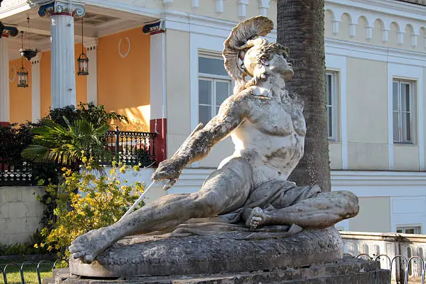 Famous statue Wounded Achilles in the garden of Achillion palace in Corfu, Greece