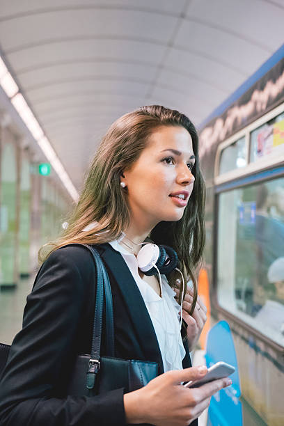 istock Beautiful Woman Waiting For The Subway Train 480201246