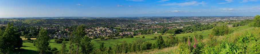 Massive panoramic shot of the west of Bradford and looking east towards the city centre. Showing mills, houses and the city centre in the distance. Stitched together from 10 vertical photos. 