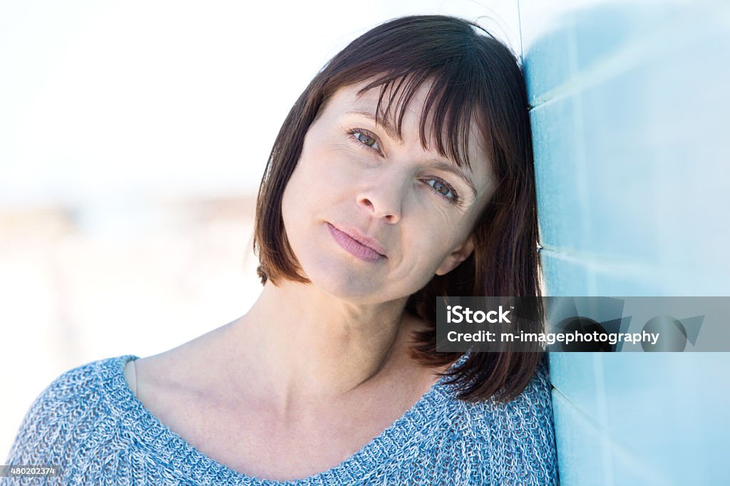 Pretty older woman Close up portrait of a pretty older woman Contemplation Stock Photo