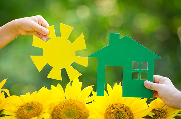 istock Children holding paper house and sun 480205489