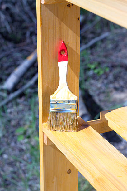 istock Brush stands on a painted wooden shelving surface 480218080