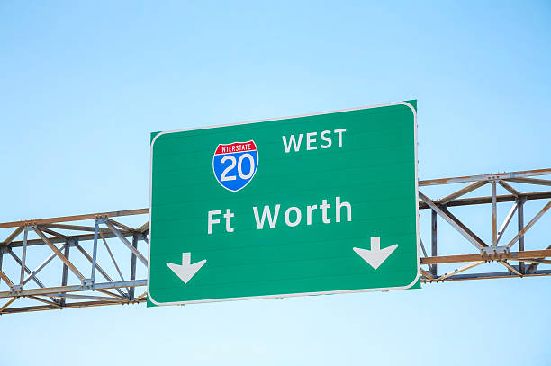 istock Road sign with the direction to Fort Worth 480221468