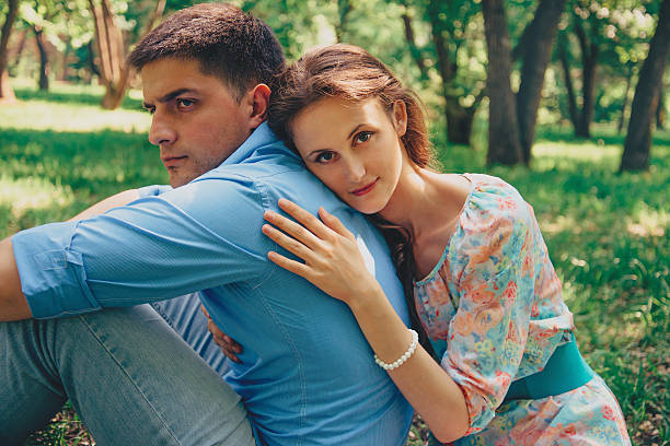 istock Loving couple resting in summer park 480222306