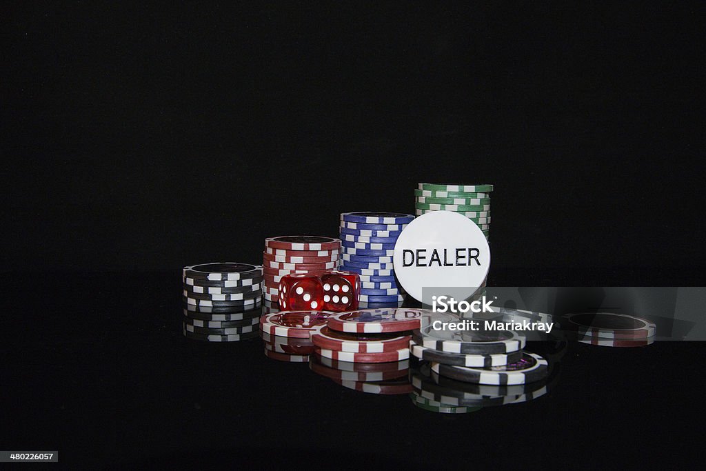 Chips Multicolored casino chips for playing poker Addiction Stock Photo