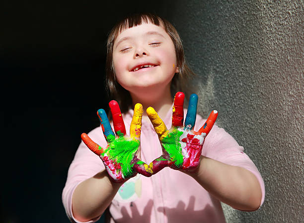 istock Cute little girl with painted hands 480228012