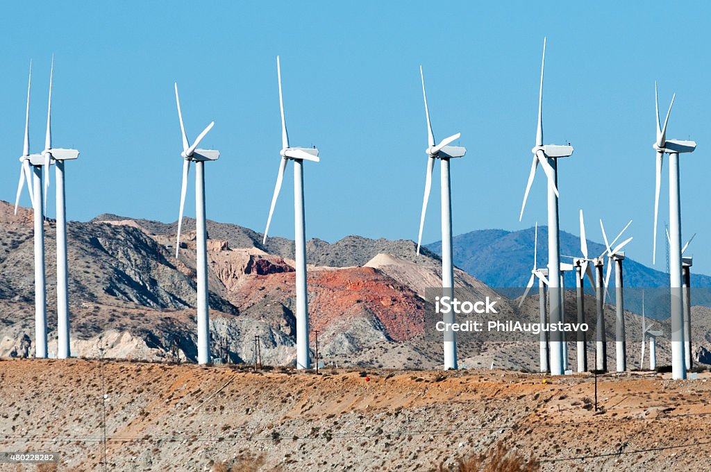 Windfarm and mine in Coachella Valley CA Windfarm and mine in desert hills of Coachella Valley CA Mining - Natural Resources Stock Photo