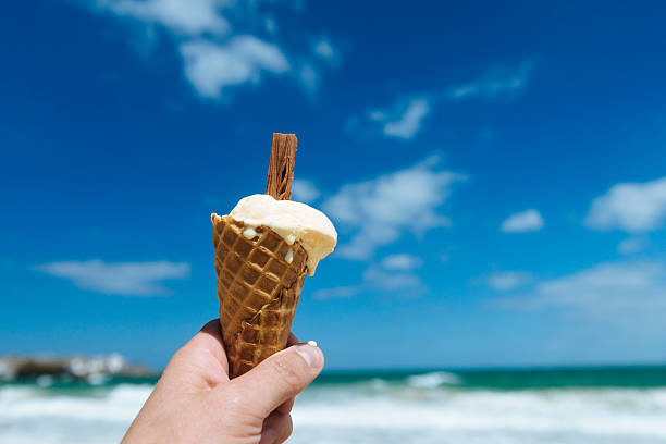 istock Melting Ice Cream cone at the Beach 480230448