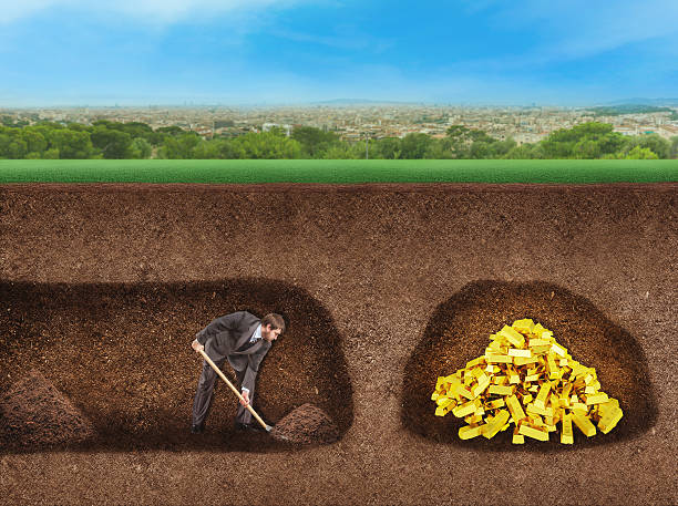 istock Businessman digs a tunnel to treasure 480231204