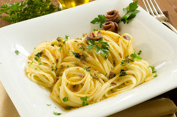 Spaghetti with bottarga and anchovies stock photo