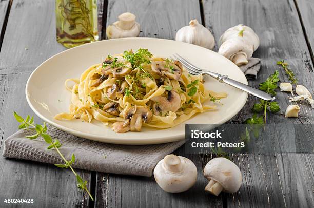 Fettuccine With Garlic And Mushrooms Stock Photo - Download Image Now - Porcini Mushroom, Pasta, Tagliatelle