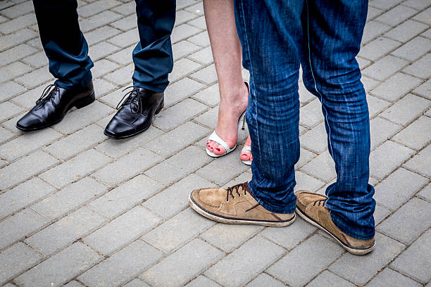 istock Human feet wearing clothes and shoes 480240780