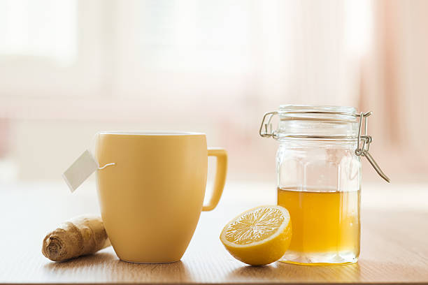 detalle de la miel y limón - ginger tea cup cold and flu tea fotografías e imágenes de stock