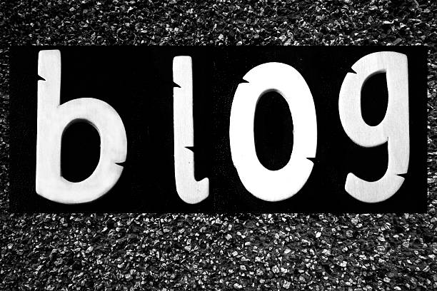 Blog - the word in white on Black