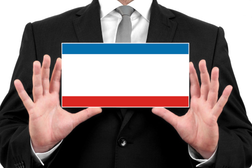 Man show his pin with french flag concept background