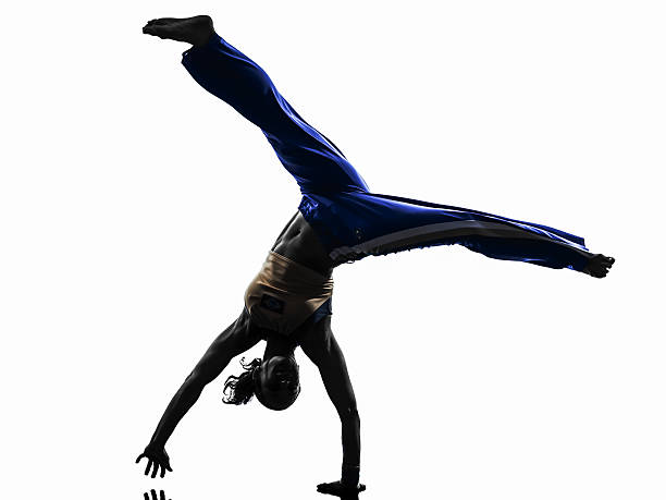 istock woman capoeira dancer dancing silhouette 480245025