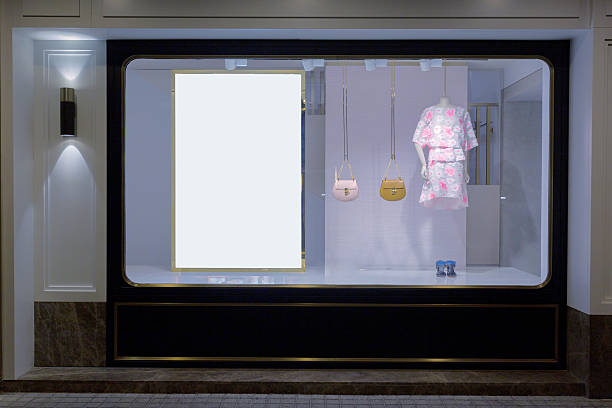 mannequin in fashion shop display window
