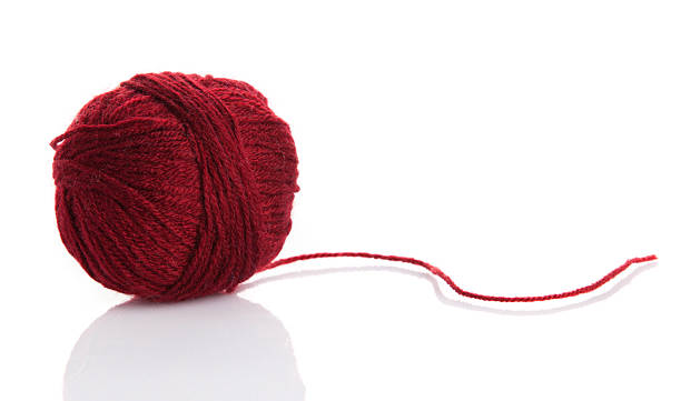 istock ball of yarn on white background 480246527