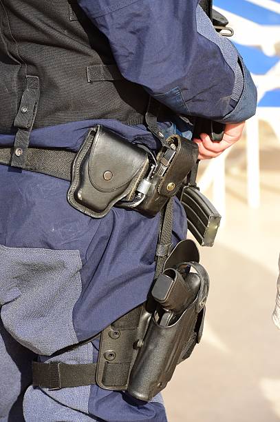 istock Police Officer with Gun 480249482