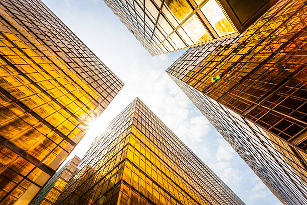 istock low angle view of modern skyscraper exterior and sky 480251144