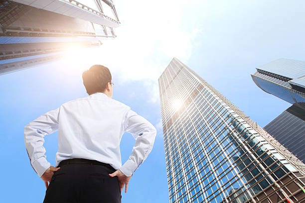 istock successful business man outdoors Next to Office Building 480256119