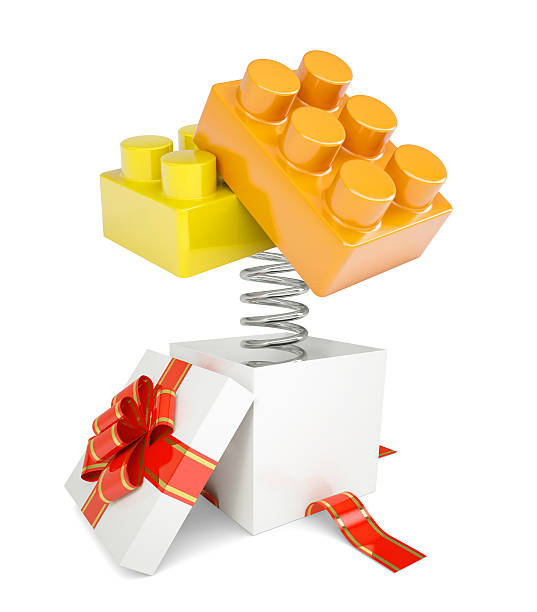 istock Gift box with red band and toy bricks 480256420