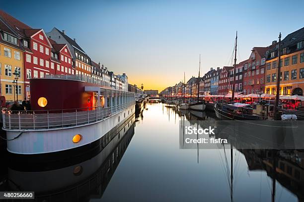 Ships In Nyhaven At Sunset Copenhagen Denmark Stock Photo - Download Image Now - Copenhagen, Harbor, Denmark