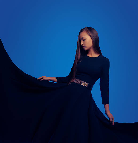 istock Woman in a style dress 480257383
