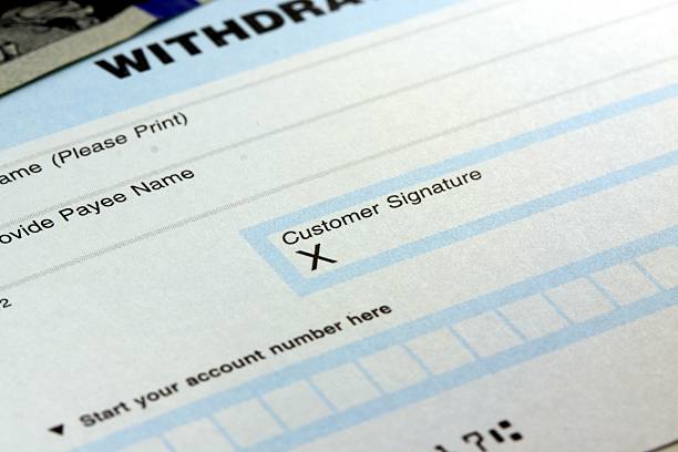 istock Withdrawal slip from bank checking or savings account 480260509