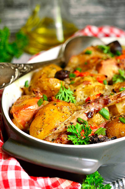 istock Rabbit baked with young potato in a cream. 480262628