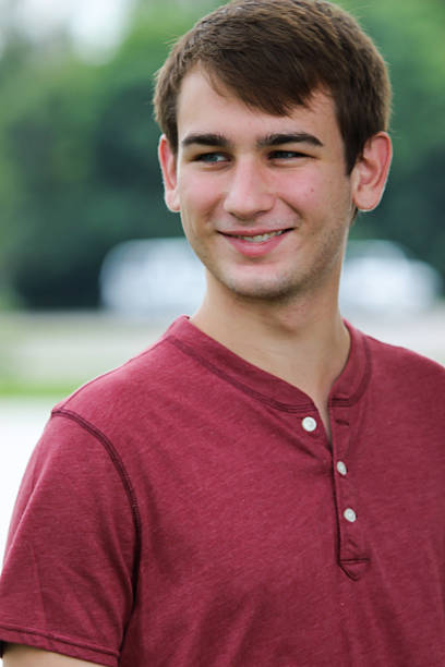 istock Teenager Smiles While Posing For Camera 480262706