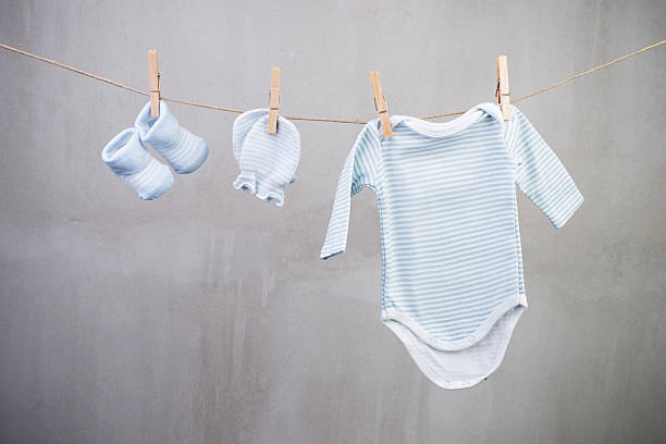 istock Baby clothes hanging on the clothesline 480262786