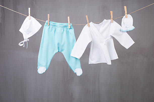 istock Baby clothes hanging on the clothesline 480262814