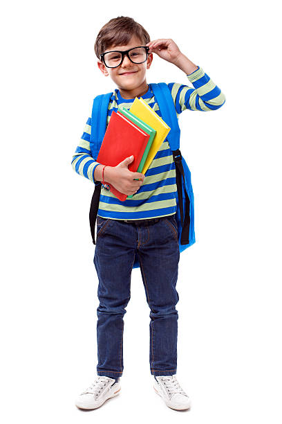 little estudante sorridente no fundo branco - child little boys isolated standing - fotografias e filmes do acervo