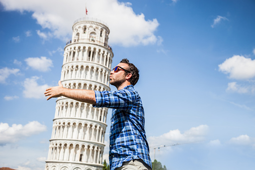 Young tourist having fun in Pisa