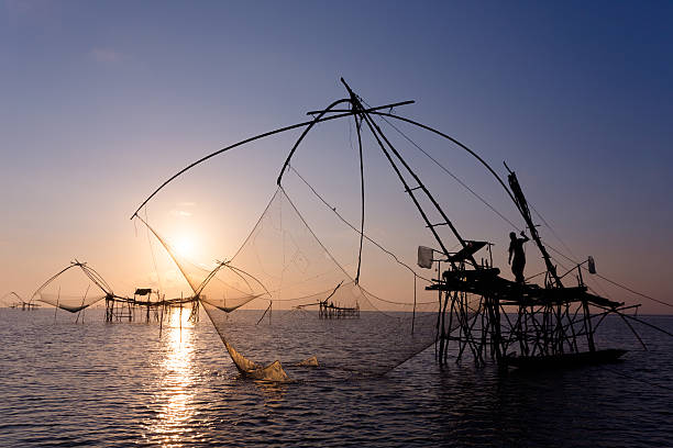 istock Fish farms and sunset 480267972