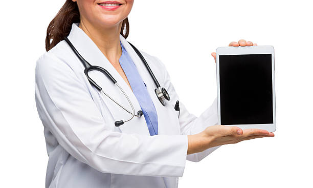 istock Happy female doctor showing digital tablet 480271778