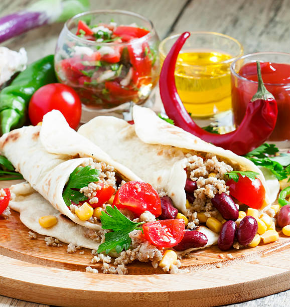 istock Traditional Mexican burritos with meat and beans 480277090