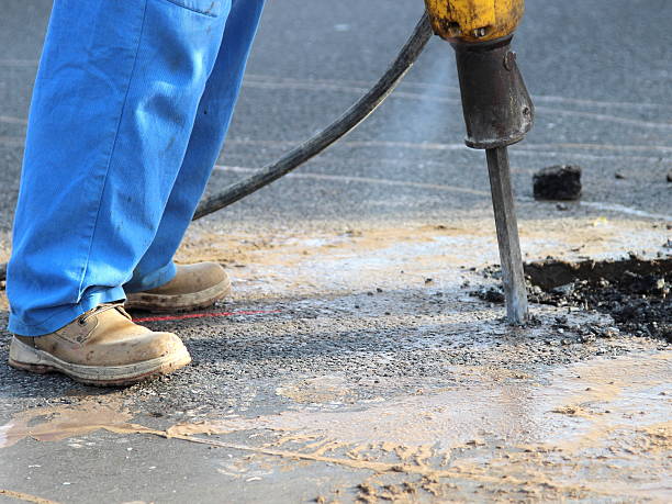 istock Road repairing works with jackhammer 480277538