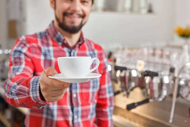 istock Close up of man giving cup with coffee 480280592