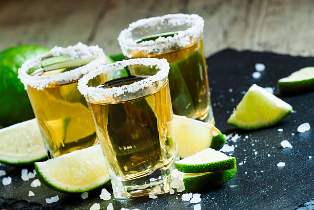 istock Gold Mexican tequila with lime and salt 480281426