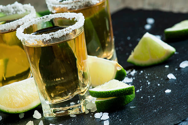 istock Gold Mexican tequila with lime and salt 480284038
