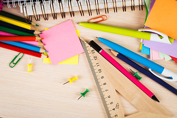 istock School and office accessories on wooden background 480284040