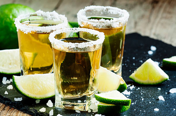 istock Gold Mexican tequila with lime and salt 480284042
