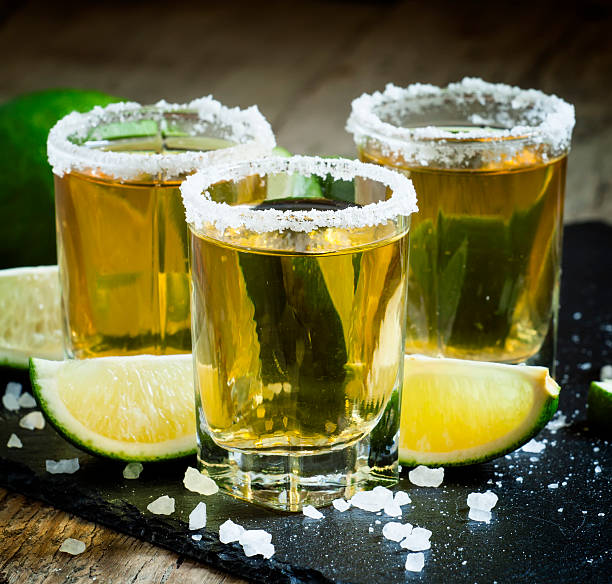 istock Gold Mexican tequila with lime and salt 480287184