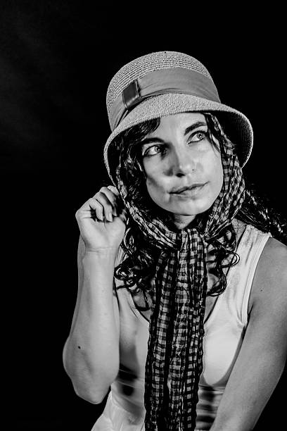 istock Teen Female Pulling On Hat Brim In Blasck And White 480287904